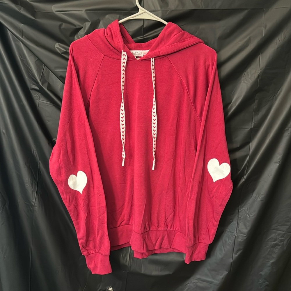 Softball Light weight hoodie with laces as strings and heart on the sleeves.